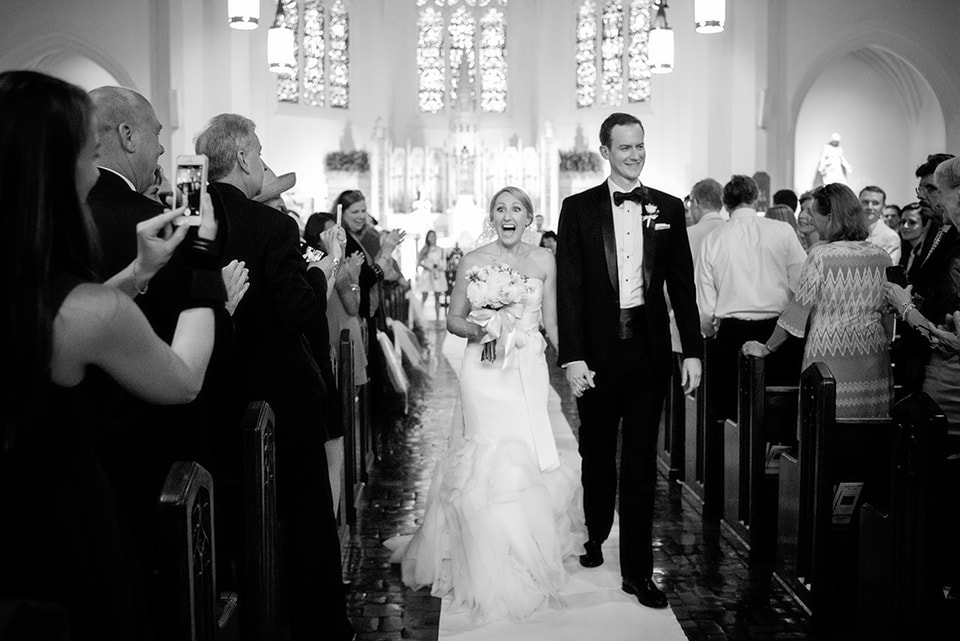 bride and groom exit church in larchmont
