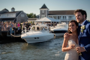 arriving to cocktail hour by boat - wychmere wedding photos