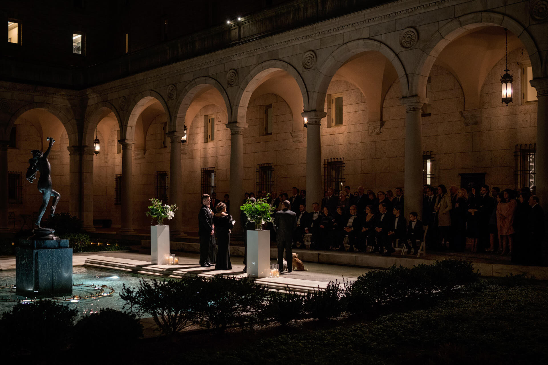 night ceremony in courtyard at a boston public library wedding