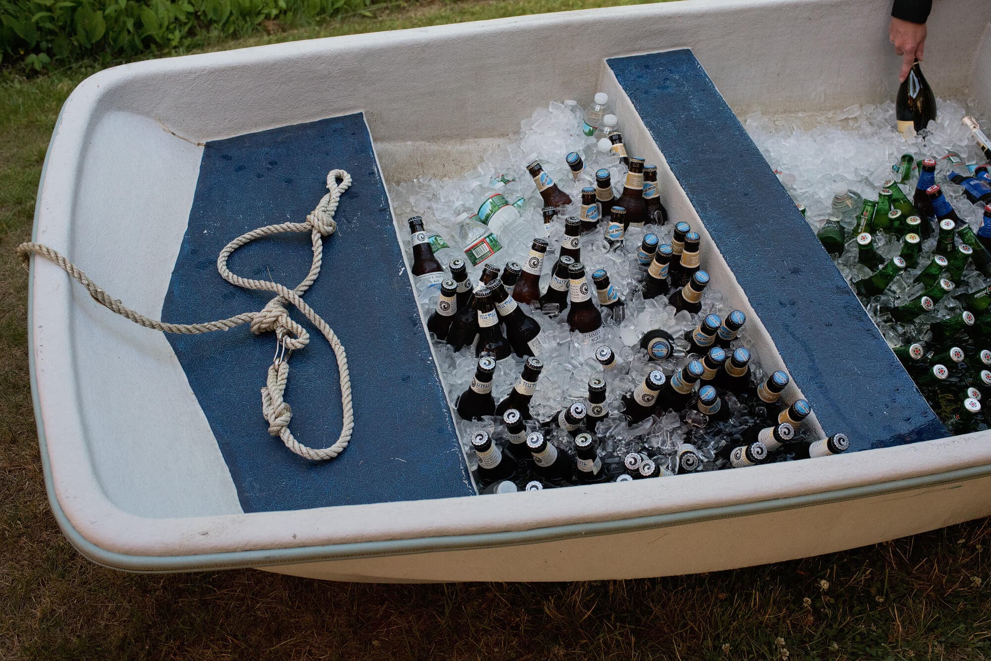 detail photo with human element boat of beers