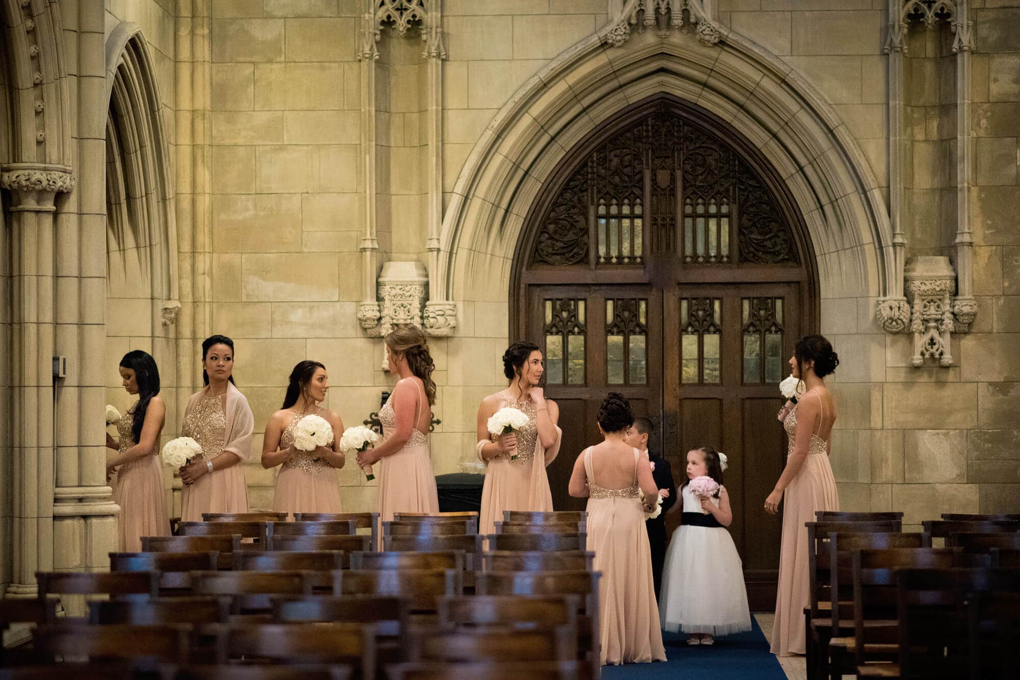 bridesmaids lined up at church before the ceremony