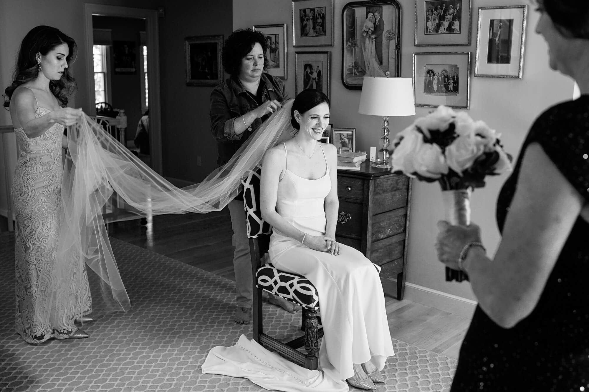 bride getting ready at home before mea wedding boston