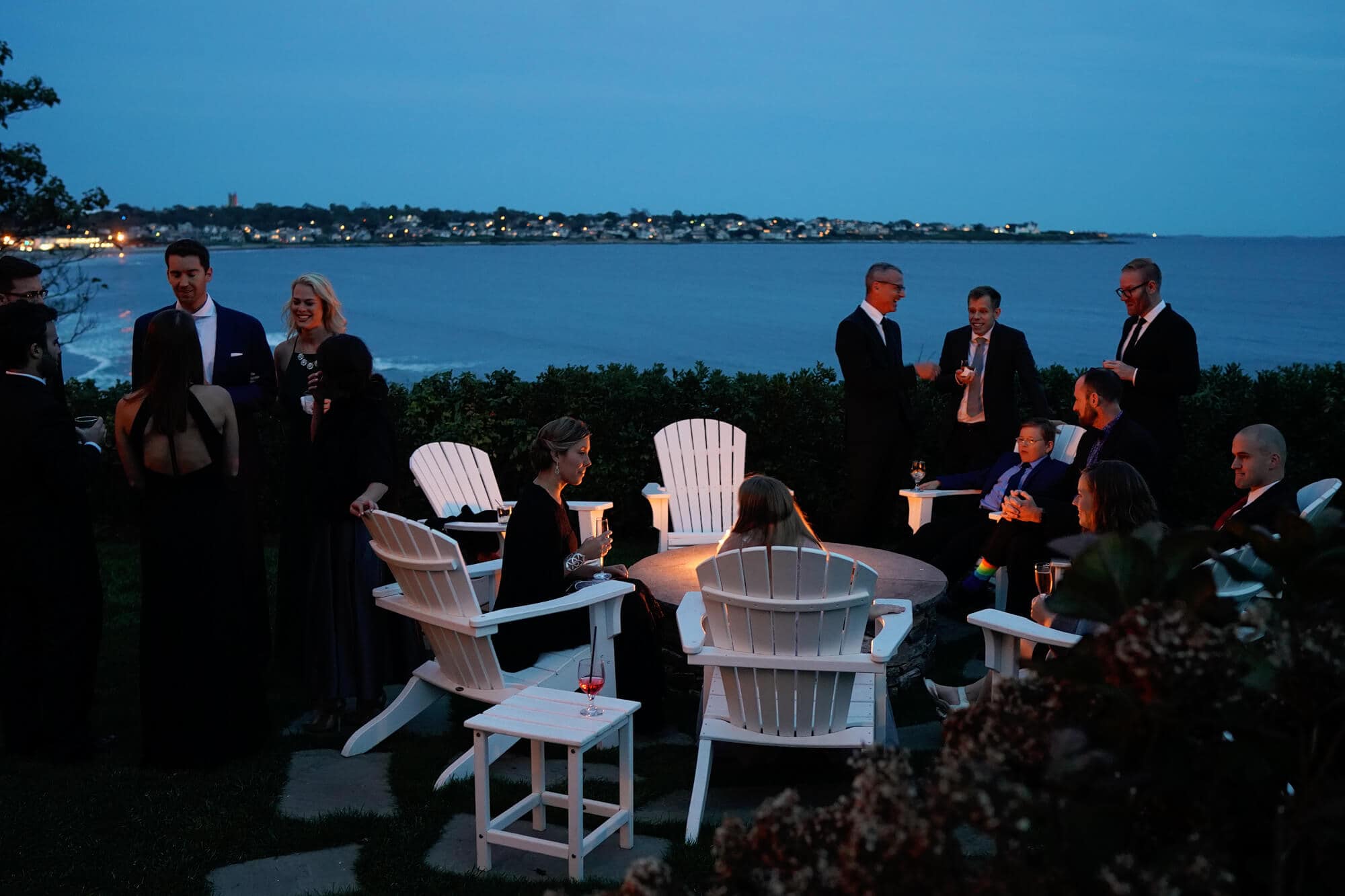 cocktail hour twilight at the chanler wedding around fire pit