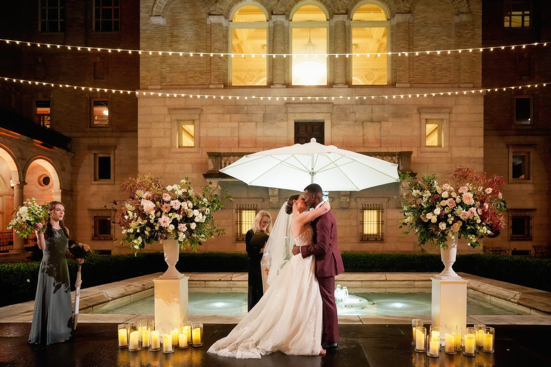 boston public library courtyard wedding ceremony in the rain